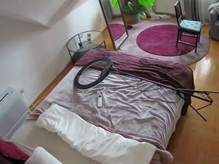 voyeurcam-julmodels-whitebed-4 webcam model stream image